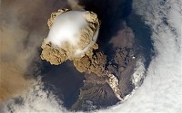 Sarychev Volcano, located in the Kuril Islands, Russia, as seen from the International Space Station in an early stage of eruption on June 12, 2009.