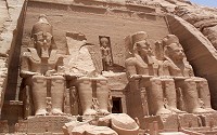 Abu Simbel temples are two massive rock temples in Nubia, originally carved out of the mountainside during the reign of Pharaoh Ramesses II in the 13th century BC, as a lasting monument to himself and his queen Nefertari.