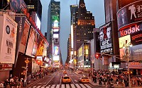 Times Square by Night - Electricity powers a large number of animated neon and LED signs and billboards that light up the famous Times Square, a major intersection in Manhattan.