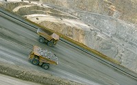 Rocks containing minerals, also called ore, are extracted through mining and transported in huge trucks to smelters.